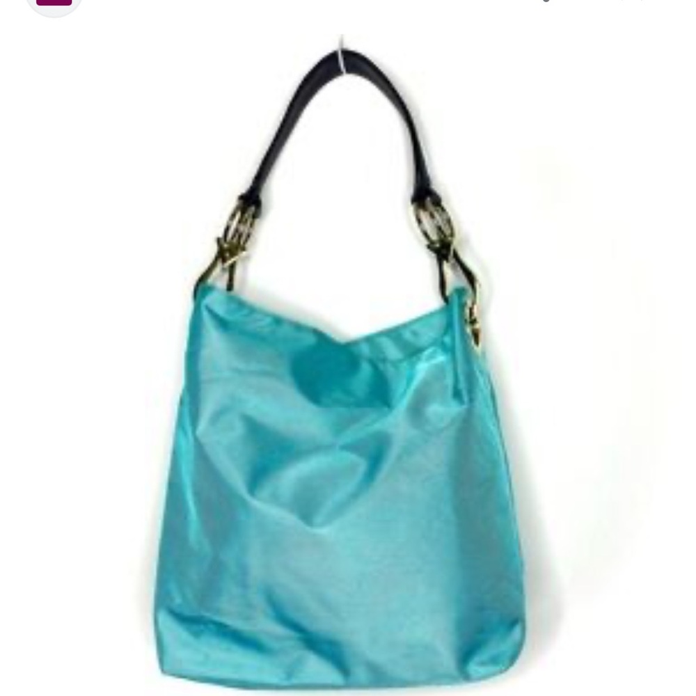 Turquoise Shoulder Bag with Black Handle. Never used